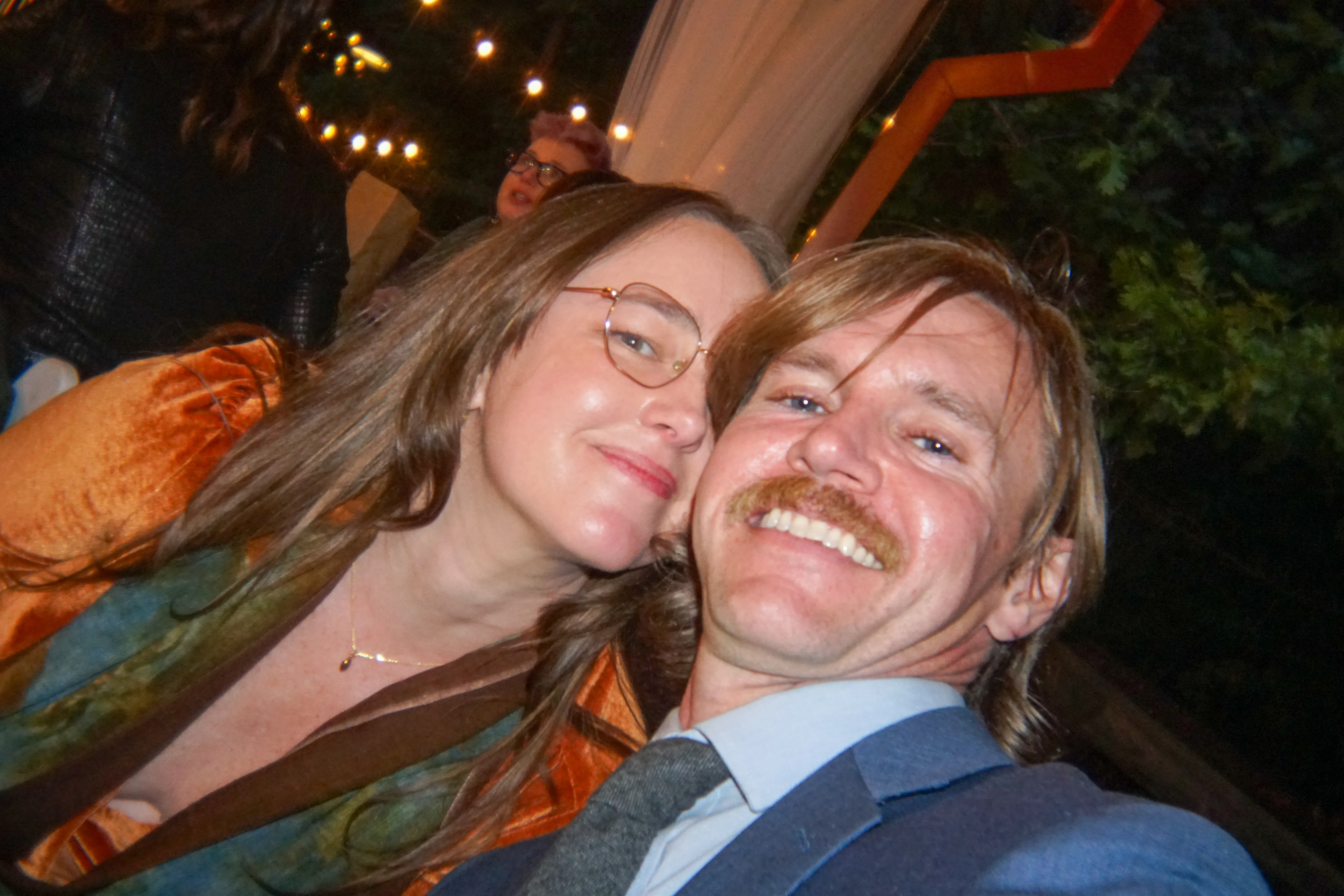 Emily and Jake at a wedding